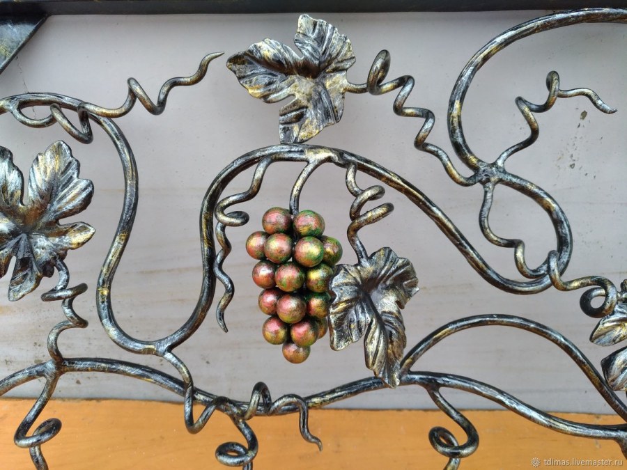 Кованые настенные подсвечники