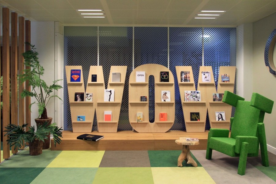 Стена с грамотами в офисе