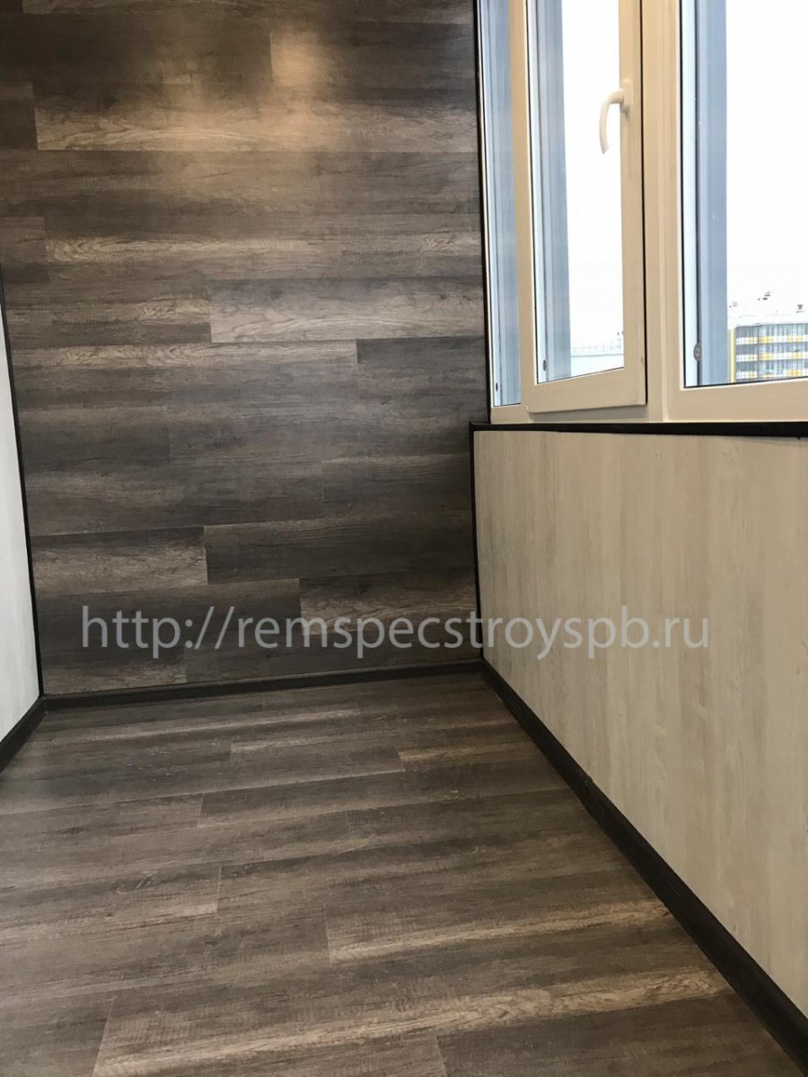 Балкон обшитый ламинатом в 2 цвета