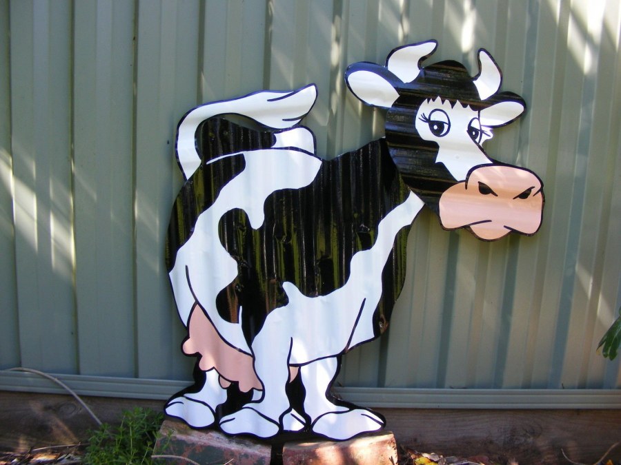 Лебеди из дерева для сада