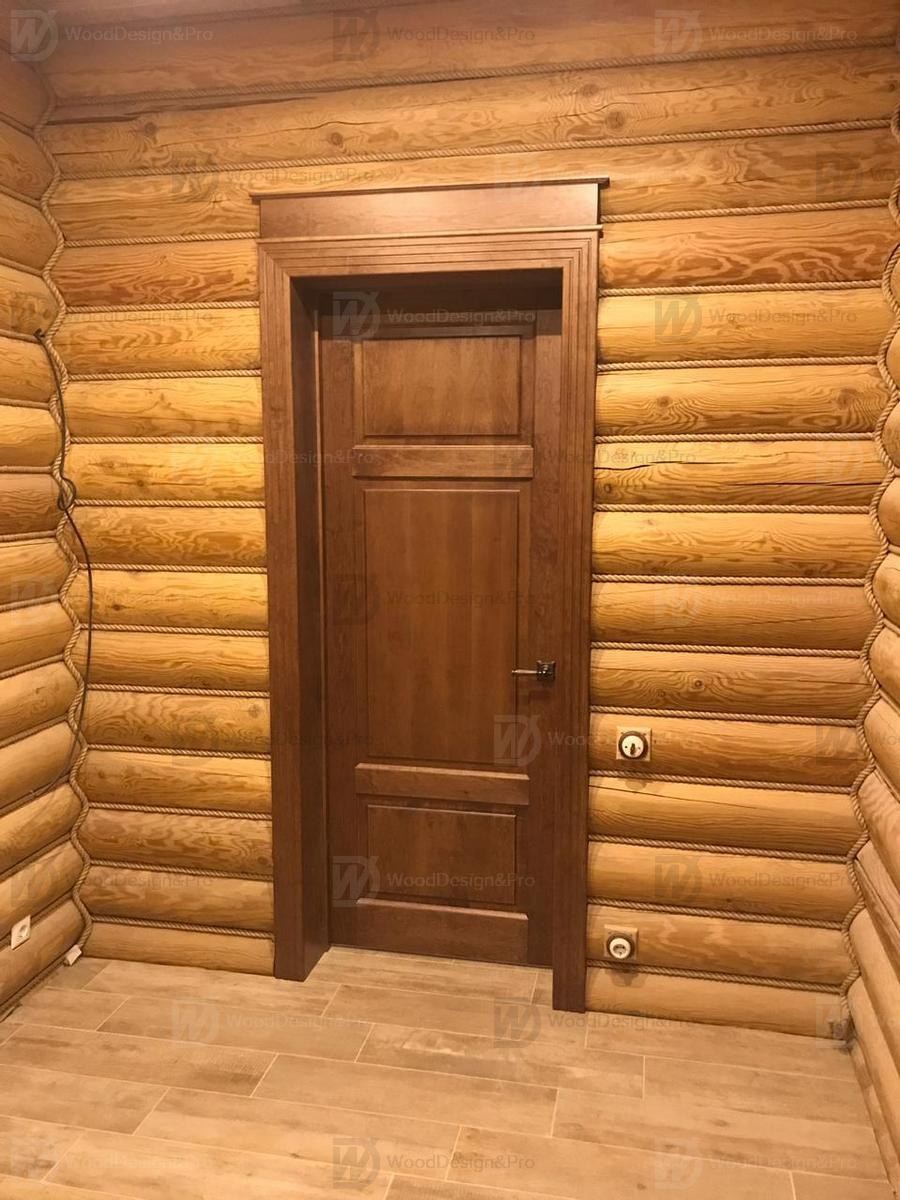 Межкомнатные двери в доме из бревна
