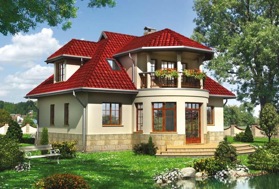 Красивый дом с эркером и мансардой