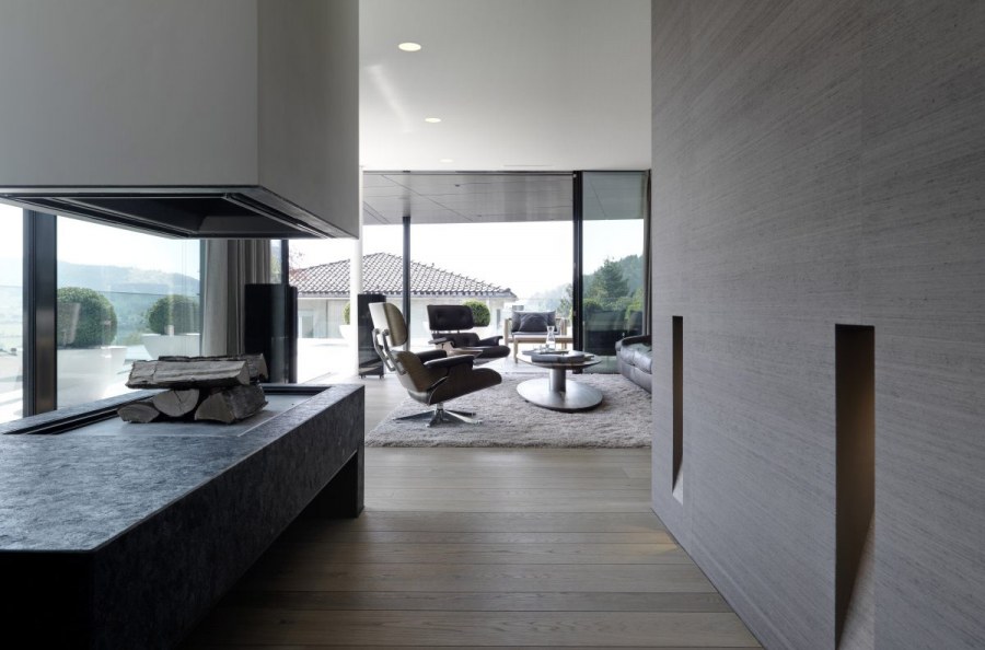 Минималистичные футуристичные интерьеры с камином