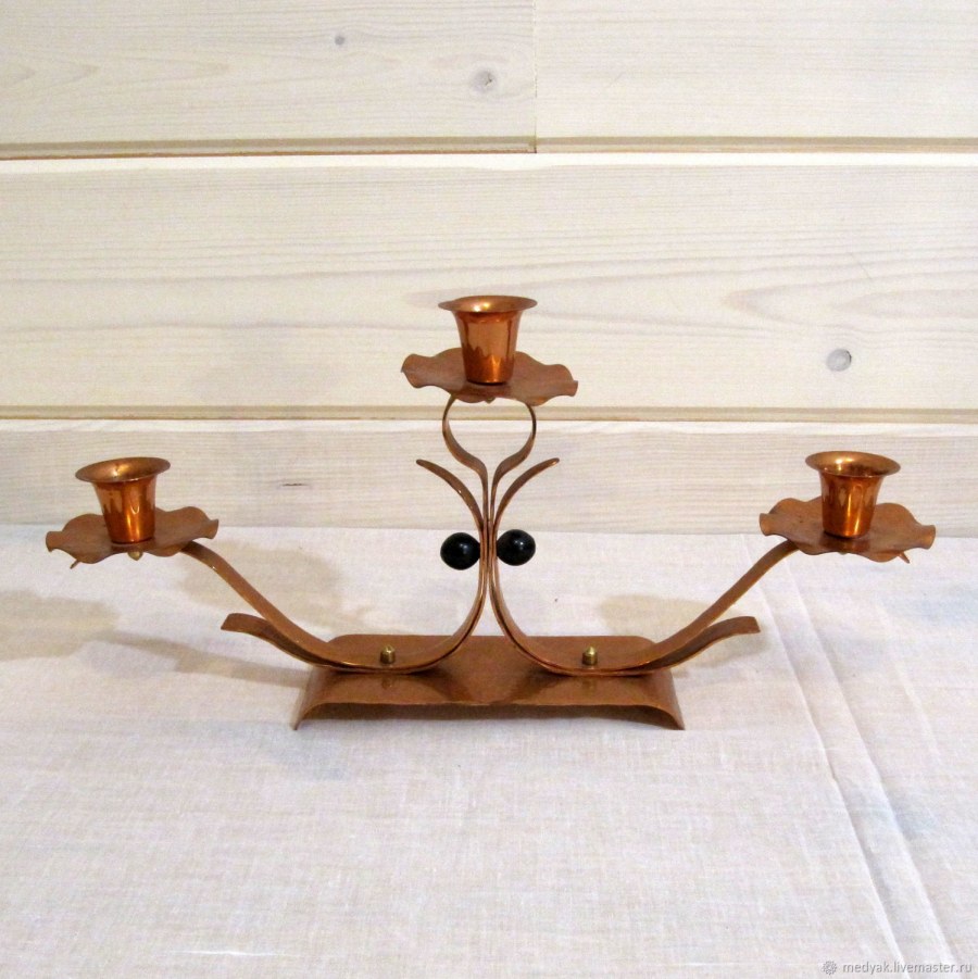 Медный канделябр