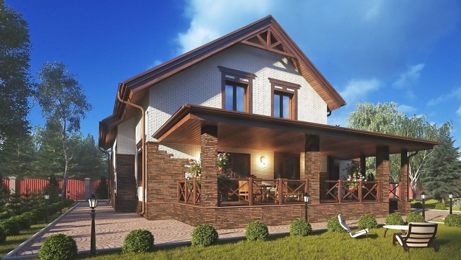 Красивый кирпичный дом с террасой