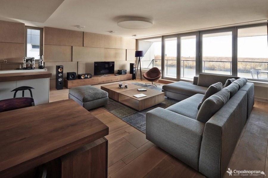 Гостиная студия с панорамными окнами