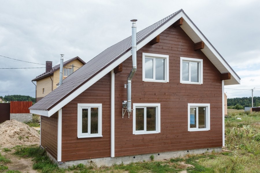 Окраска деревянного дома