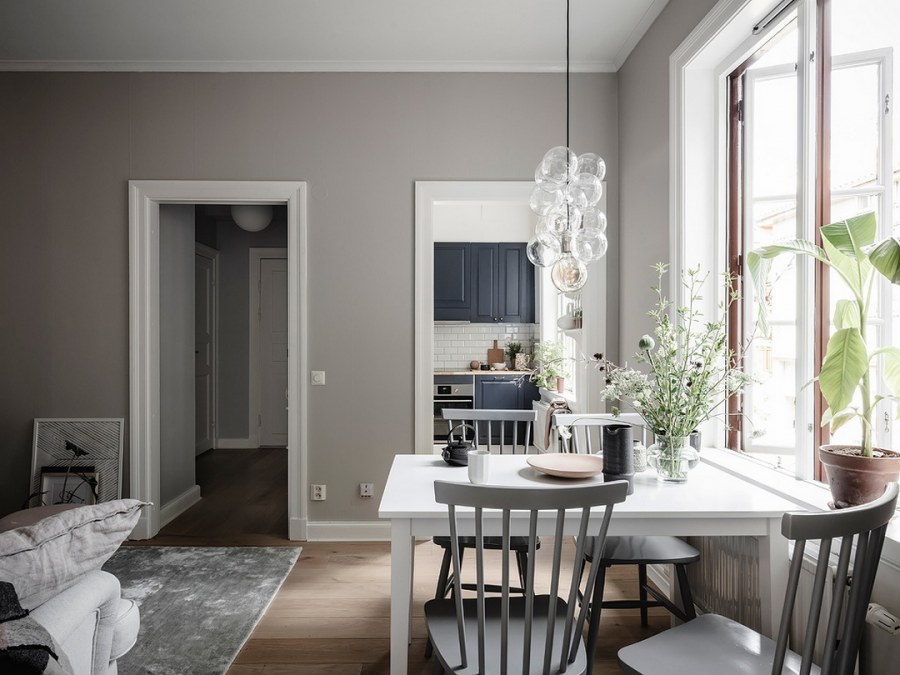 Гостиная в скандинавском стиле с обеденной зоной в хрущевке