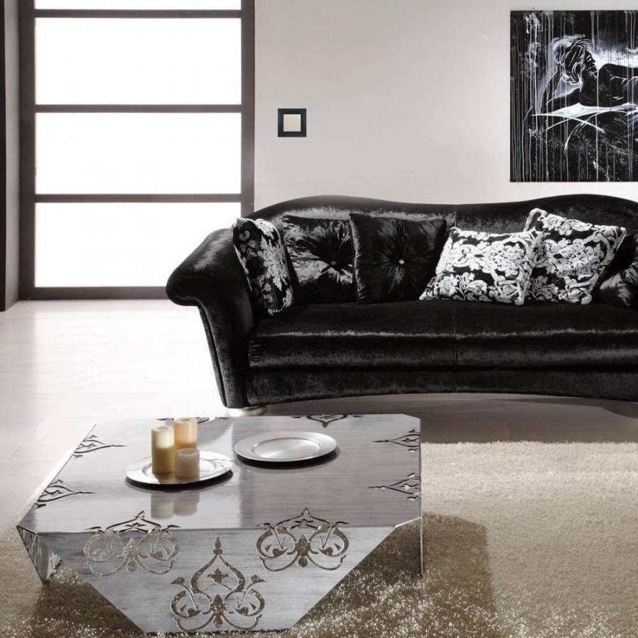 Черный кожаный диван в интерьере