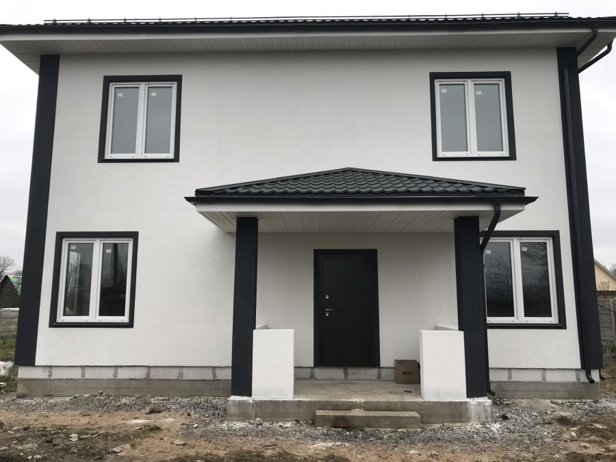 Отделка фасада короедом