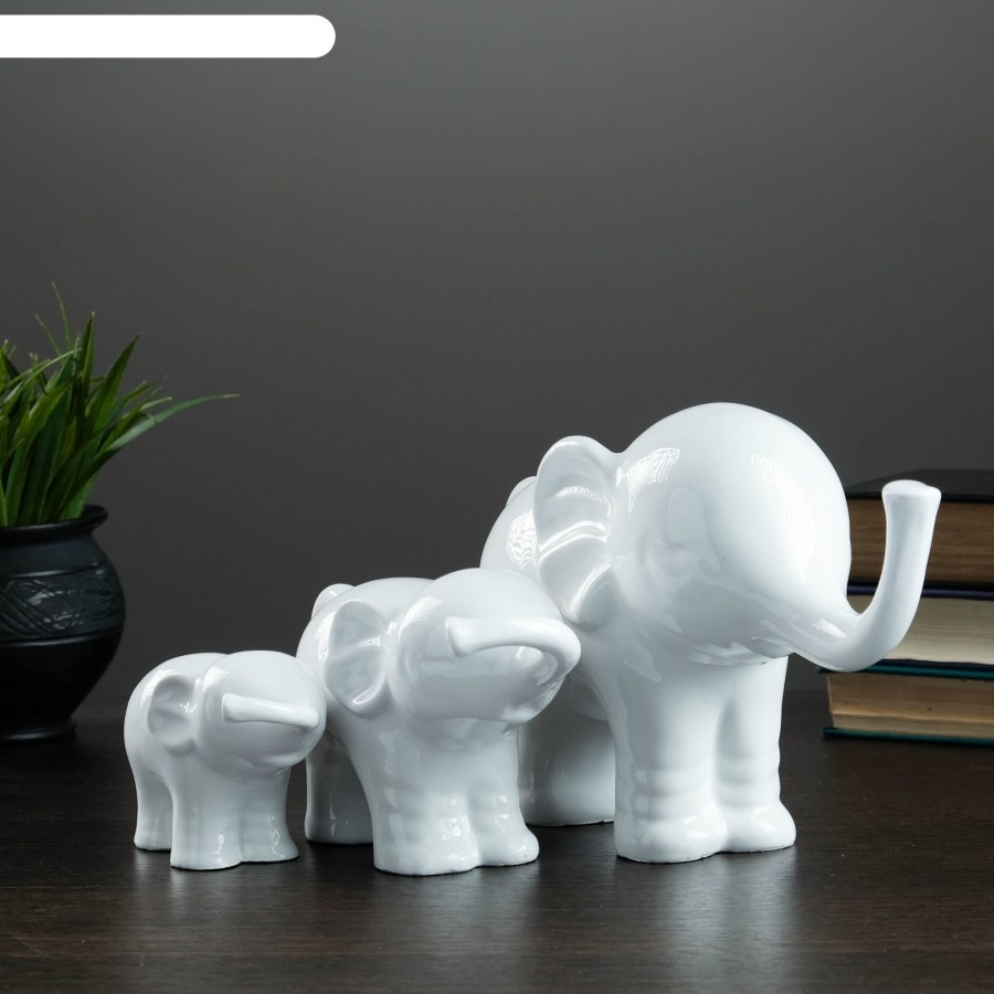 Фигурки слонов в интерьере