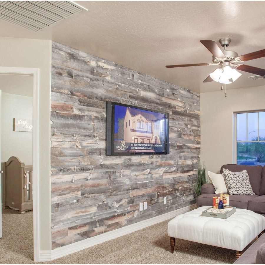 Отделка стен ламинатом в интерьере гостиной