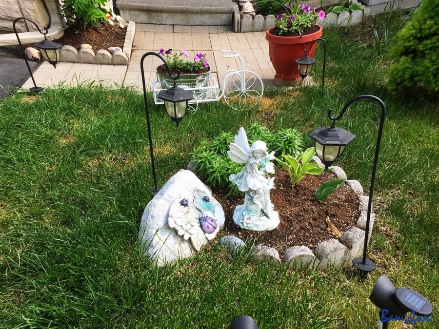 Клумбы с фигурками для сада