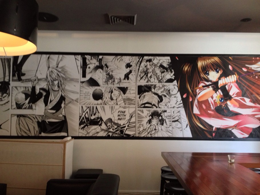 Манга на стене в комнате