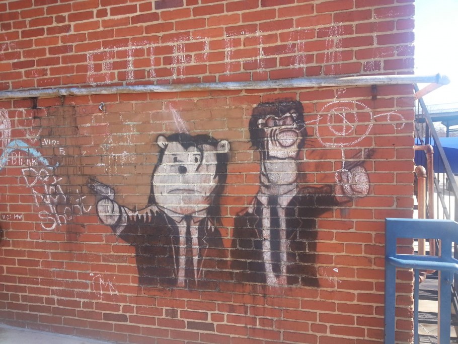 Картина на кирпичной стене