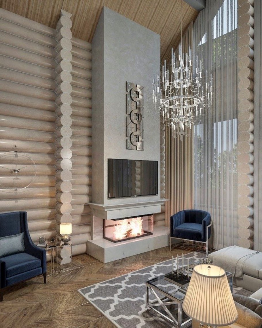 Камин в интерьере гостиной загородного дома