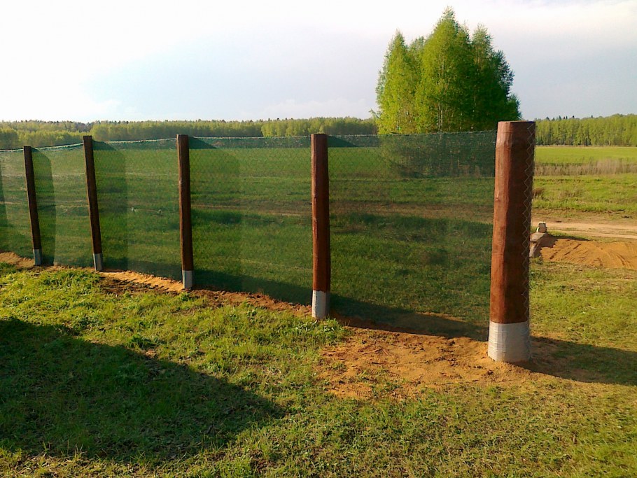 Ограждение из бревен