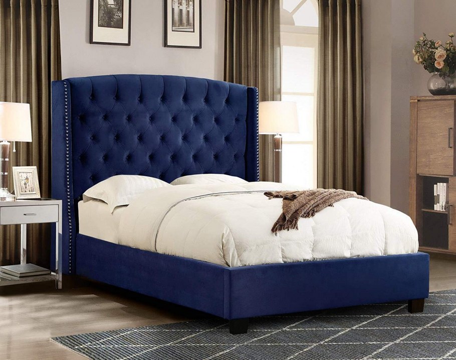 Синяя кровать с мягким изголовьем