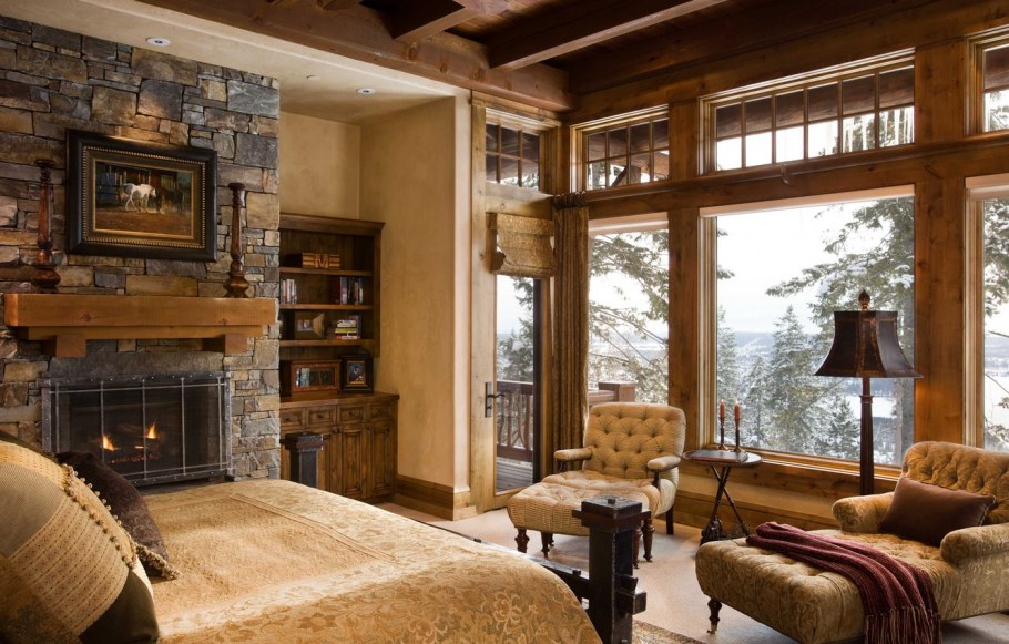 Спальня с камином в деревянном доме