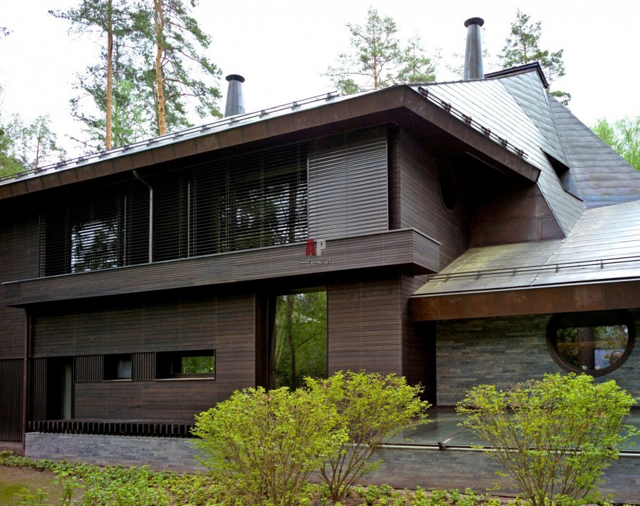 Современные коттеджи из темного кирпича