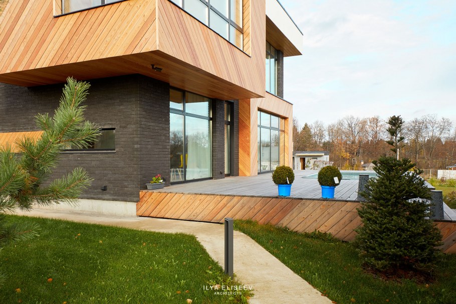 Одноэтажный дом с плоской крышей в стиле лофт