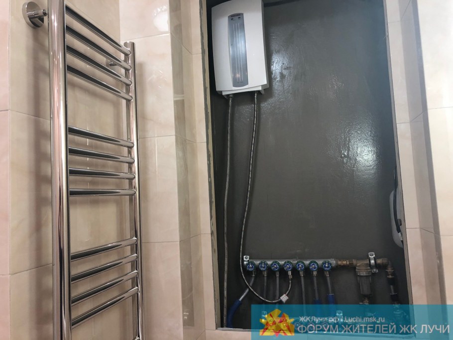 Полотенцесушитель электрический над унитазом