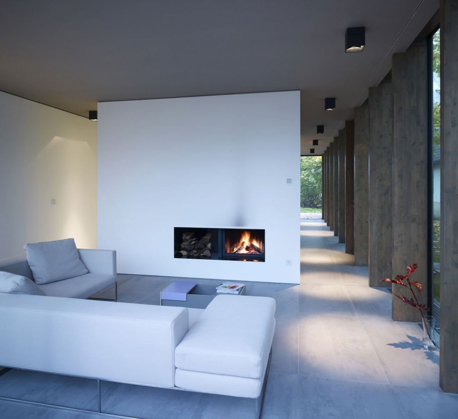 Камин в доме в стиле минимализма