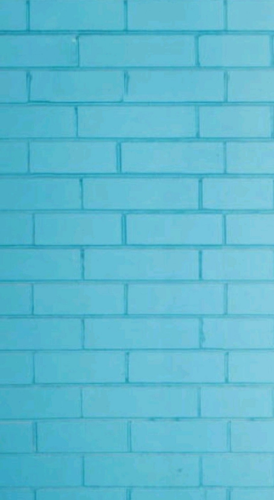 Кирпичная стена бирюзового цвета