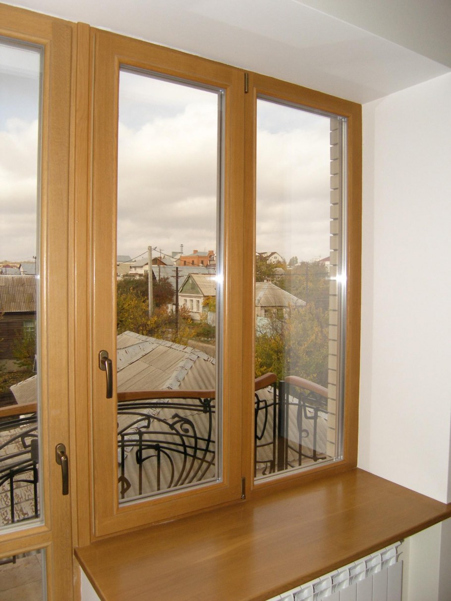 Пластиковые окна с ламинацией под дерево