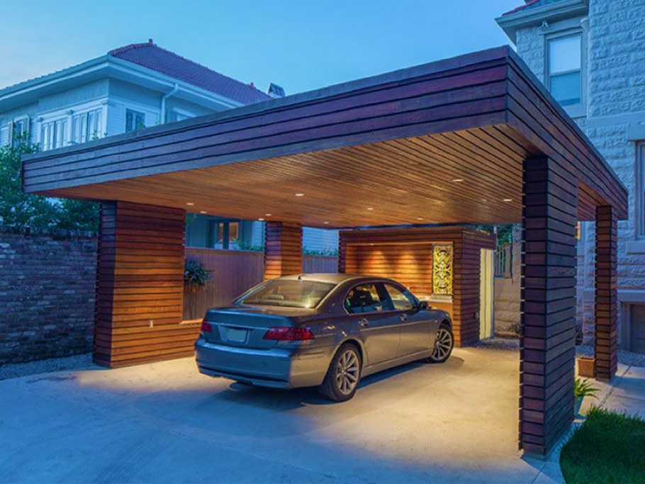 Современный дом с навесом для машины