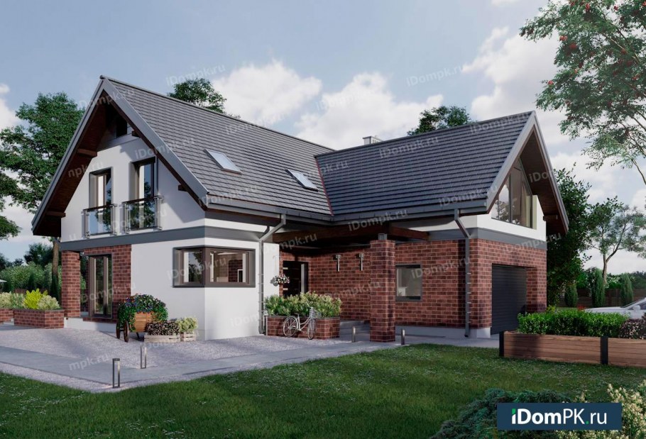 Угловой дом с гаражом и мансардой