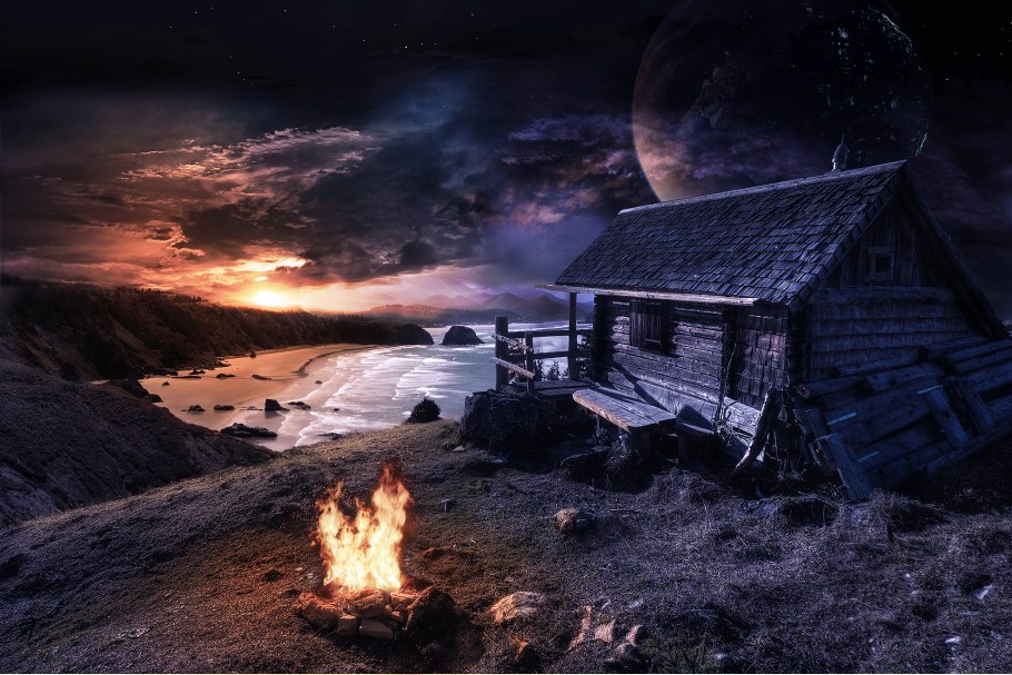 Домик на берегу моря ночью