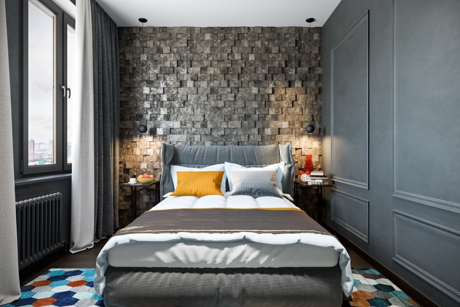 Спальня с кирпичной стеной у изголовья кровати
