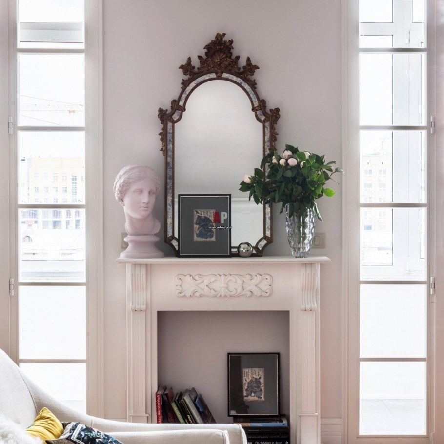 Имитация камина в интерьере гостиной