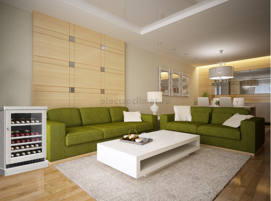 Зеленый диван в бежевом интерьере