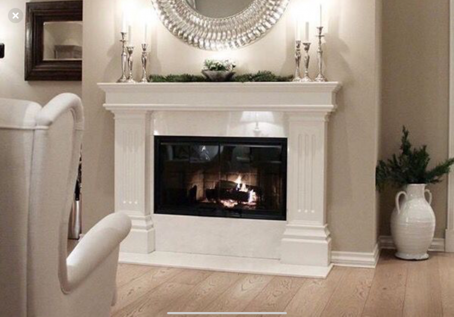 Зеркало над камином