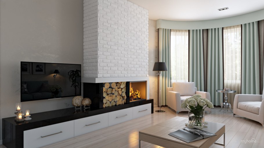 Светлый интерьер гостиной с камином