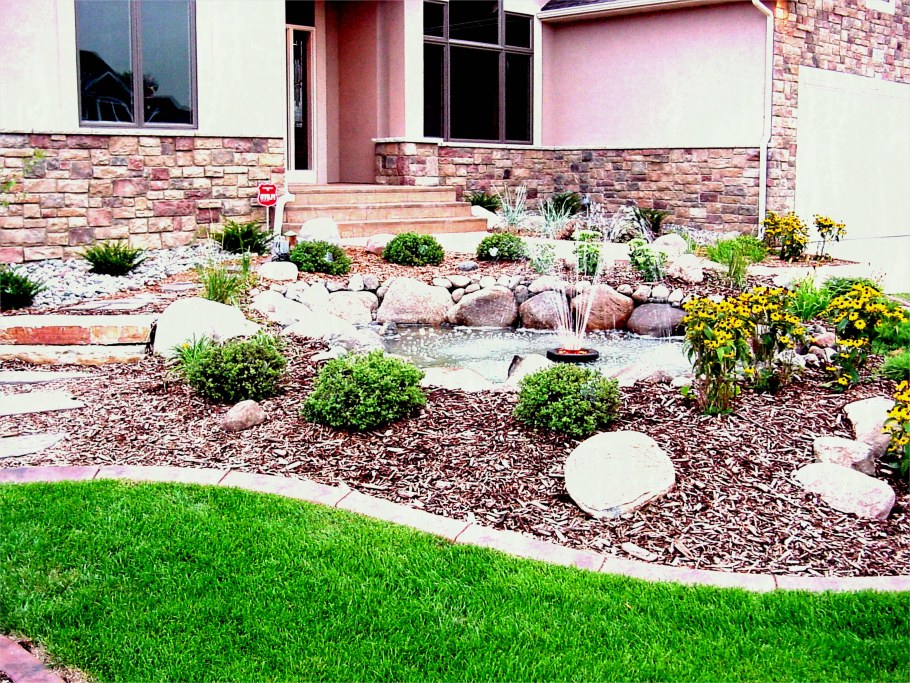 Камень и хвойники в ландшафтном