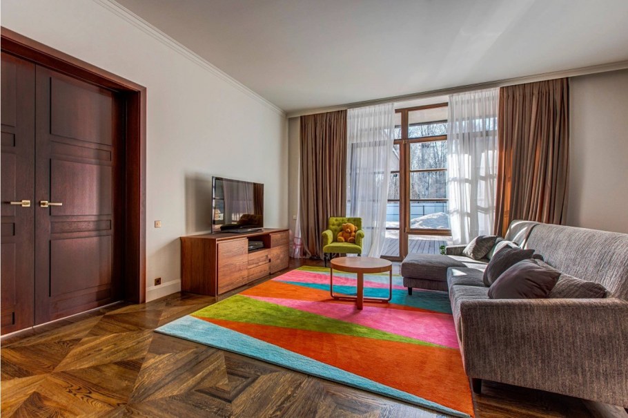 Ковры в интерьере гостиной современный стиль