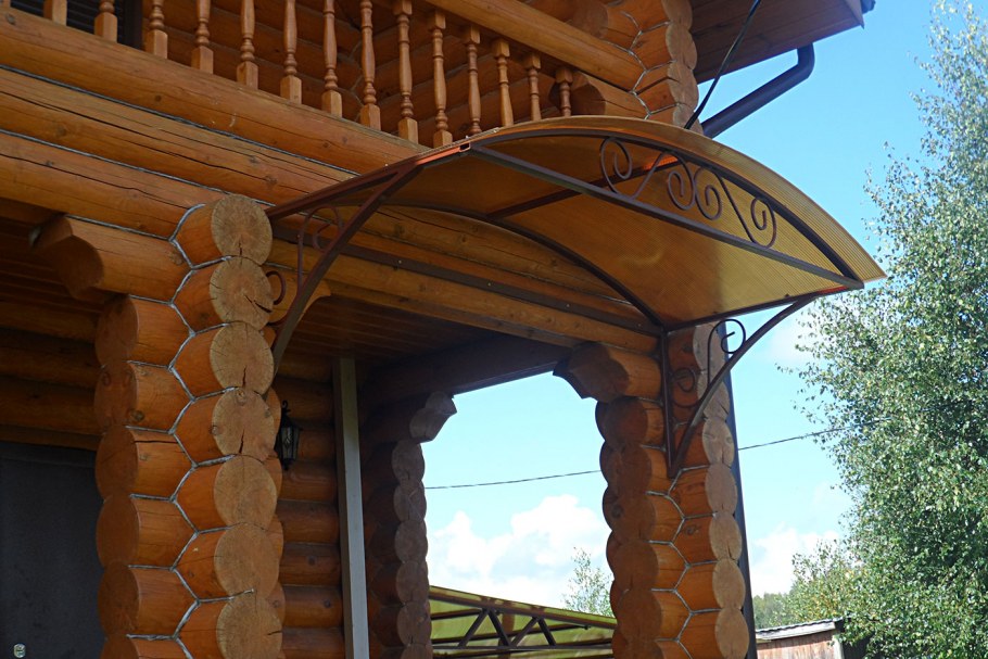 Козырьки на деревянный дом