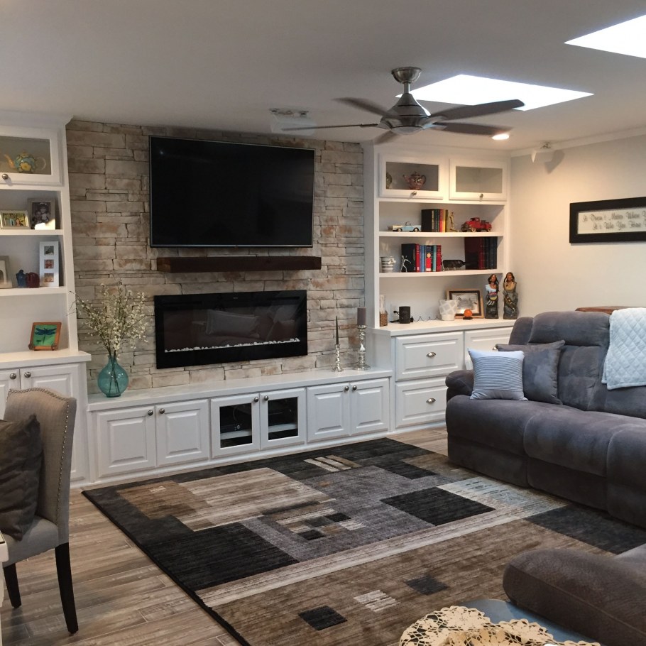 Стенка в гостиную с камином и телевизором