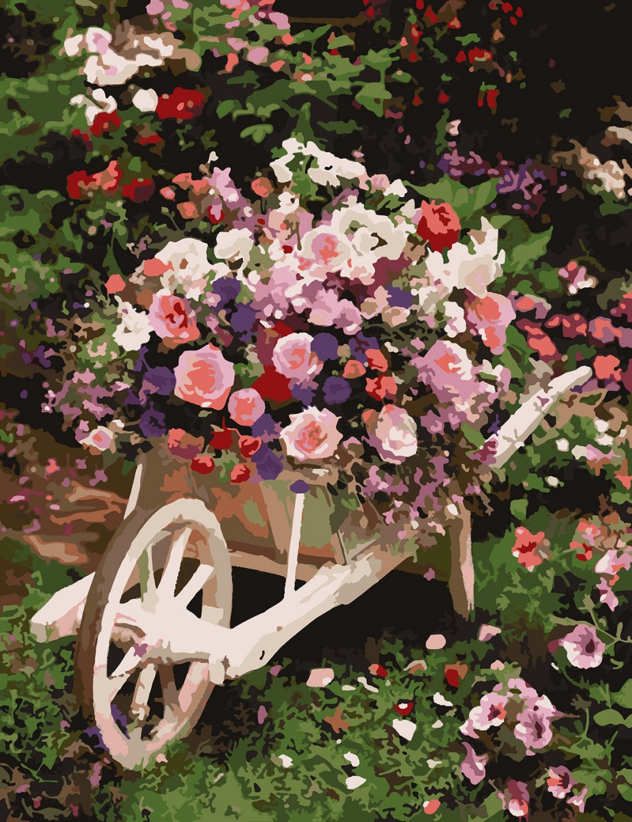 Тележка с цветами в саду