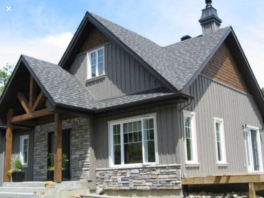 Каркасный дом серый фасад