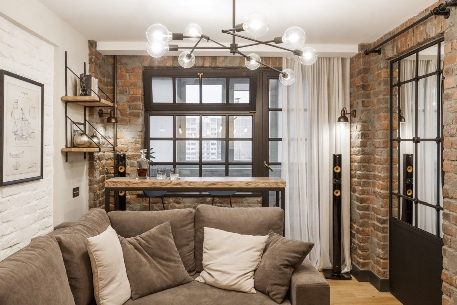 Современная кухня гостиная с кирпичной стеной