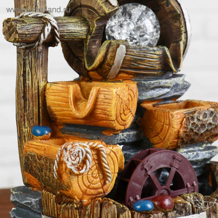 Декоративный фонтан с деревом