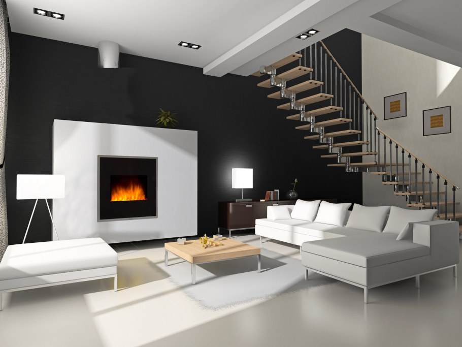 Интерьер гостиной с камином и лестницей