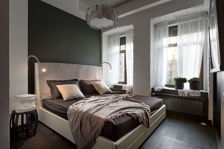 Интерьер спальни с темным полом