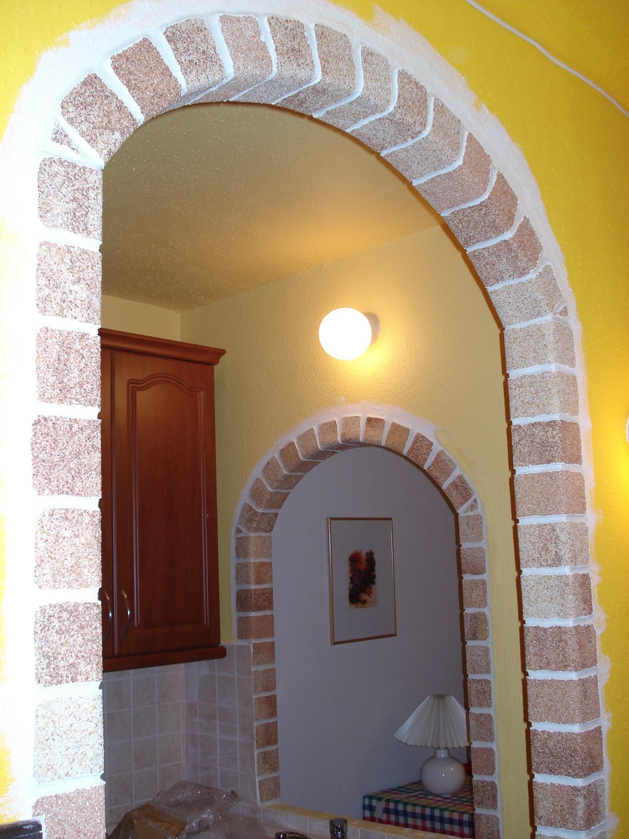 арка выложенная камнем фото