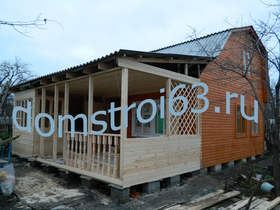 Пристройка к дачному дому с душем и туалетом и террасой