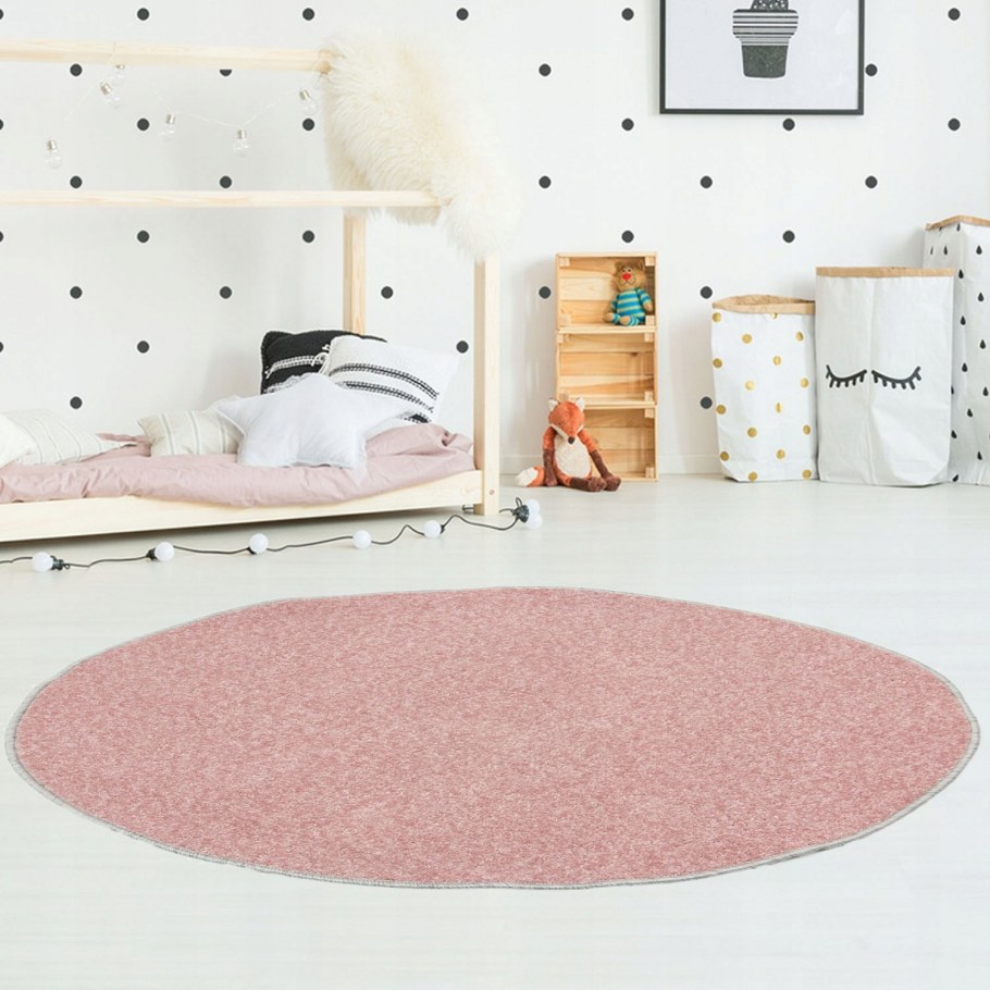 Ковер круглый розовый